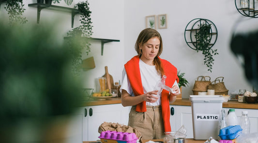 A woman in the kitchen exploring sustainable alternatives to plastic for daily use